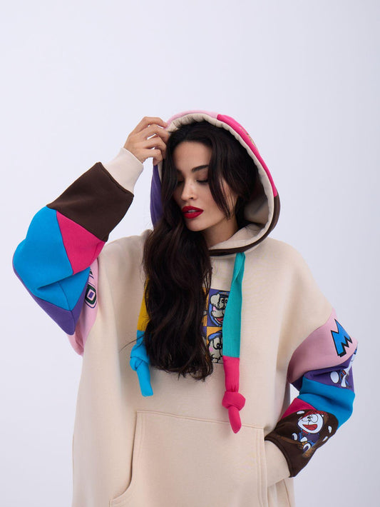 Colorful Patchwork Hoodie with Cartoon Graphics