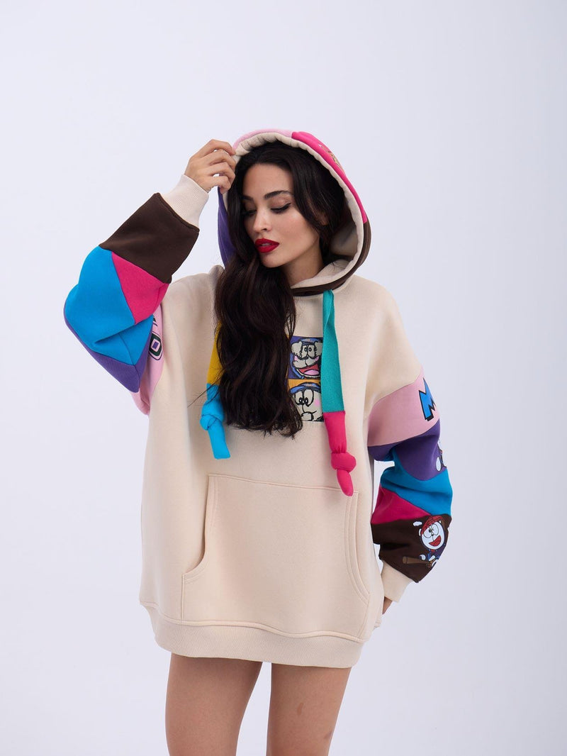 Colorful Patchwork Hoodie with Cartoon Graphics